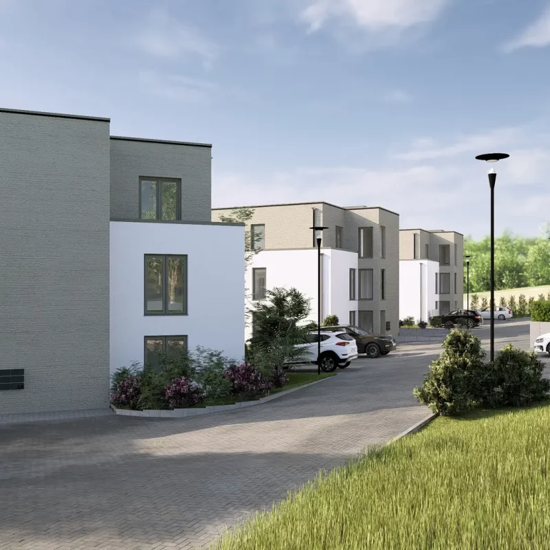 Erschließungsstraße im Wohnquartier Eicherwald in Erbes-Büdesheim mit Mehrfamilienhäusern und Stellplätzen