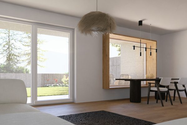 Wohnzimmer mit bodentiefen Fenstern, Blick in den Garten und Essbereich mit Sitzfenster-Nische.