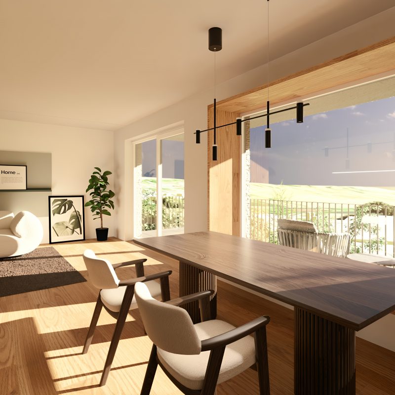 Wohnbereich mit Sitzfenster und Blick auf den Balkon in WEITBLICK Zornheim bei Tageslicht